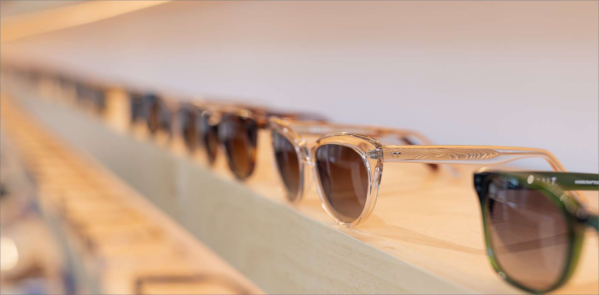 sunglasses on a shelf