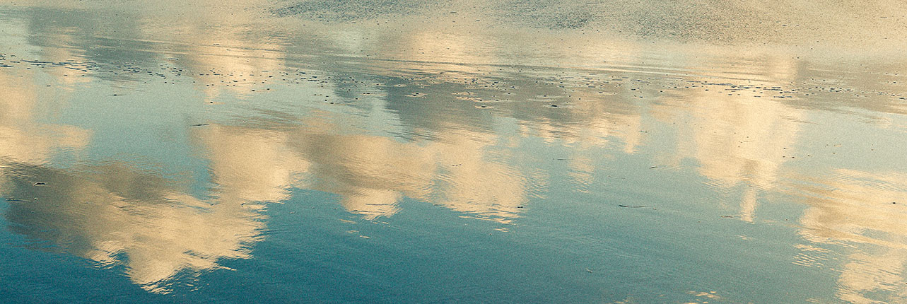 sky reflected on water