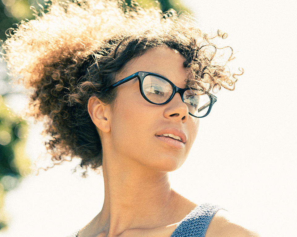 model with glasses looking to the right